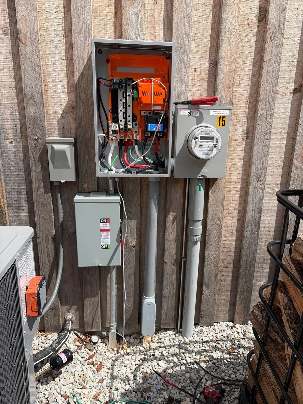 Exterior electrical service and solar integration equipment installed by JL Electrical Solutions
